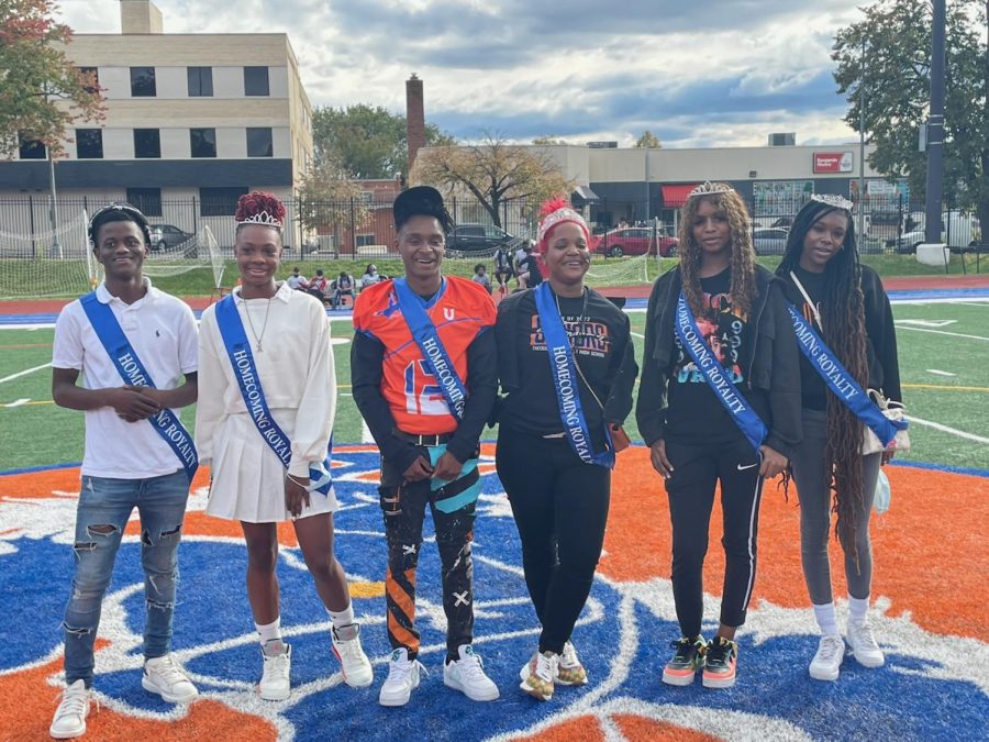 Roosevelt Homecoming King and Queen, Duke and Duchess, and Lordesses stand before their subjects on the field. Students thought they should be honored with a dance.