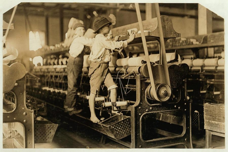 Lewis Hine documented child labor in photographs like this one of children working in a Macon, Georgia mill in 1909. His photos helped expose the problem, and child labor was eventually outlawed in the U.S. in 1938.
